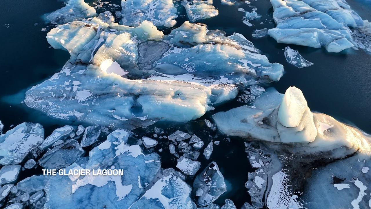 An Icelandic glacier lagoon with captions from an original narration, rendered in FME.